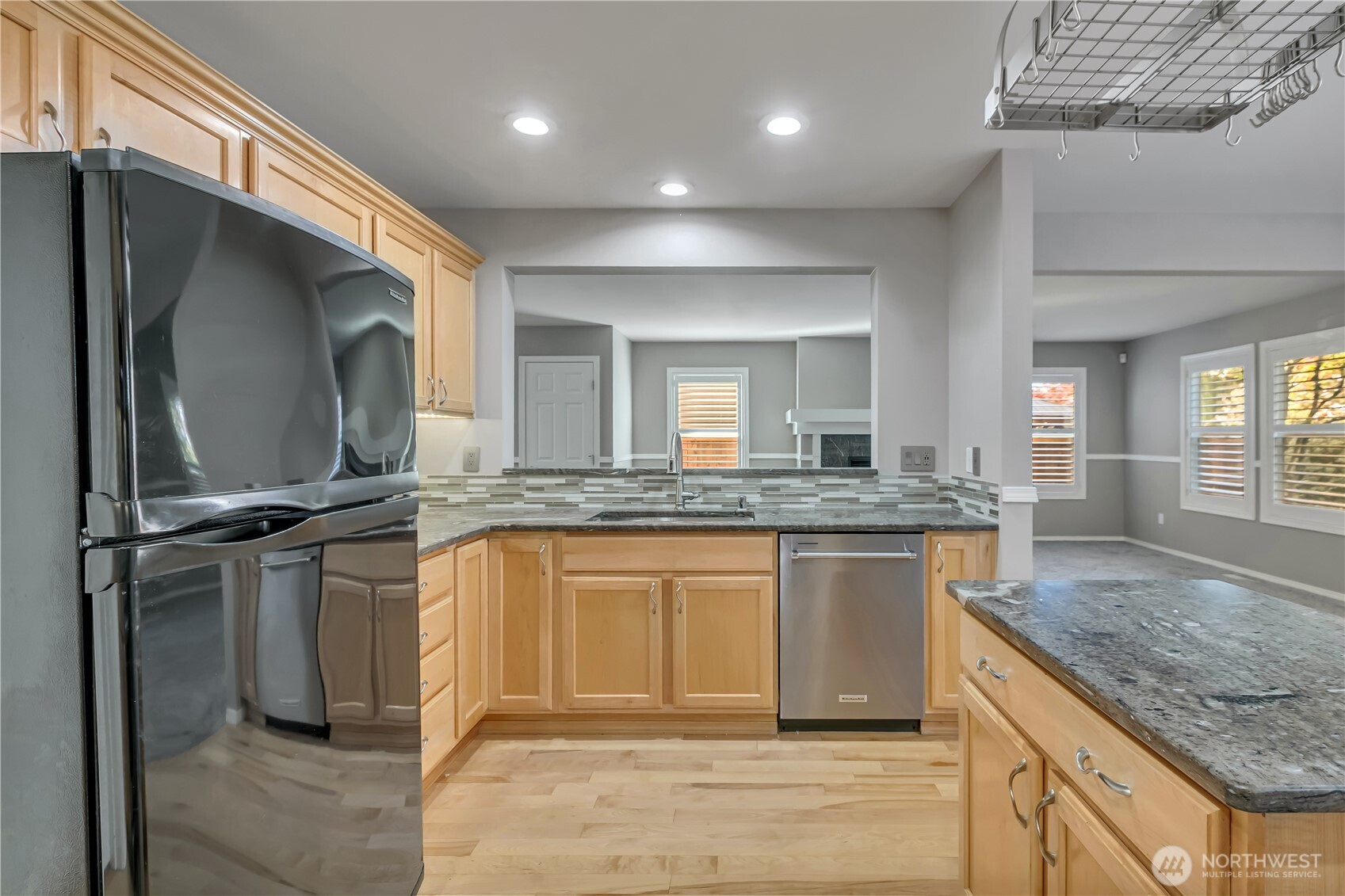 23516 Southeast 243rd Place Maple Valley, WA 98038 - Photo 14 of 33 a bathroom with a granite countertop sink and a mirror