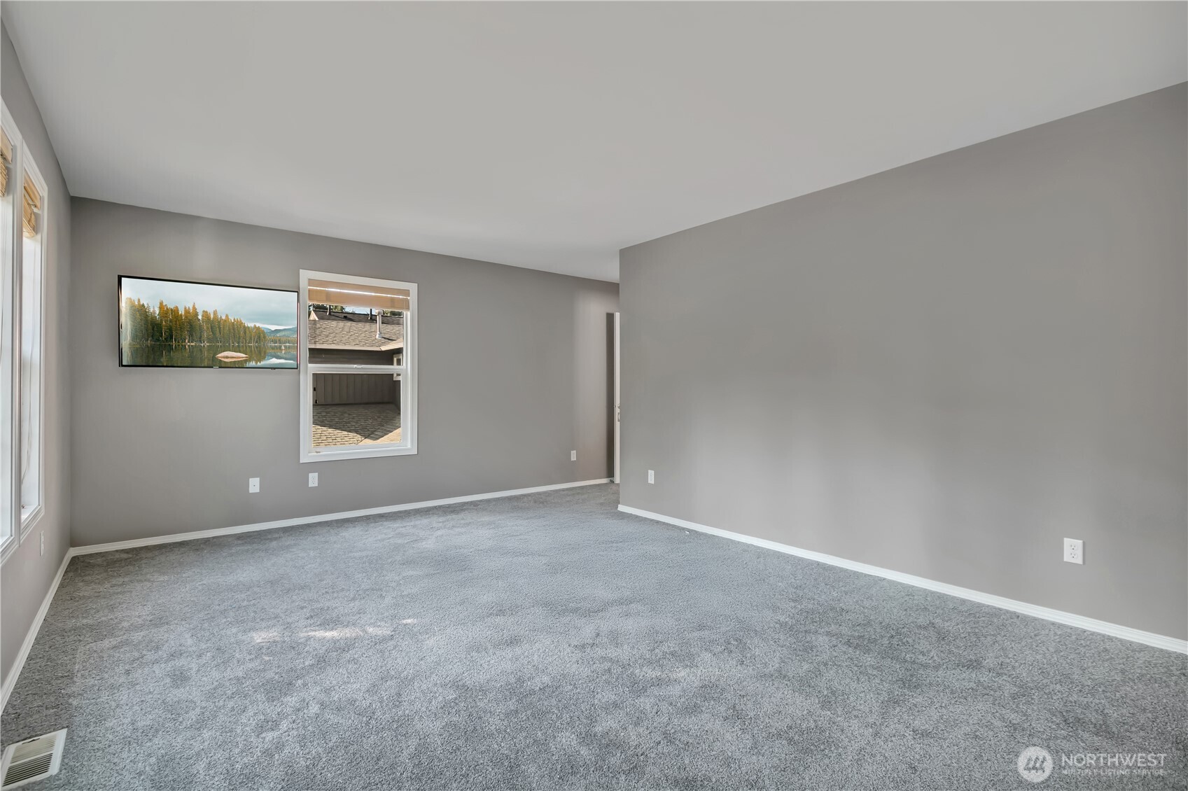 23516 Southeast 243rd Place Maple Valley, WA 98038 - Photo 20 of 31 a view of empty room with windows