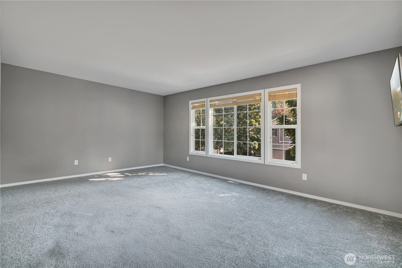 23516 Southeast 243rd Place Maple Valley, WA 98038 - Photo 21 of 33 an empty room with a window