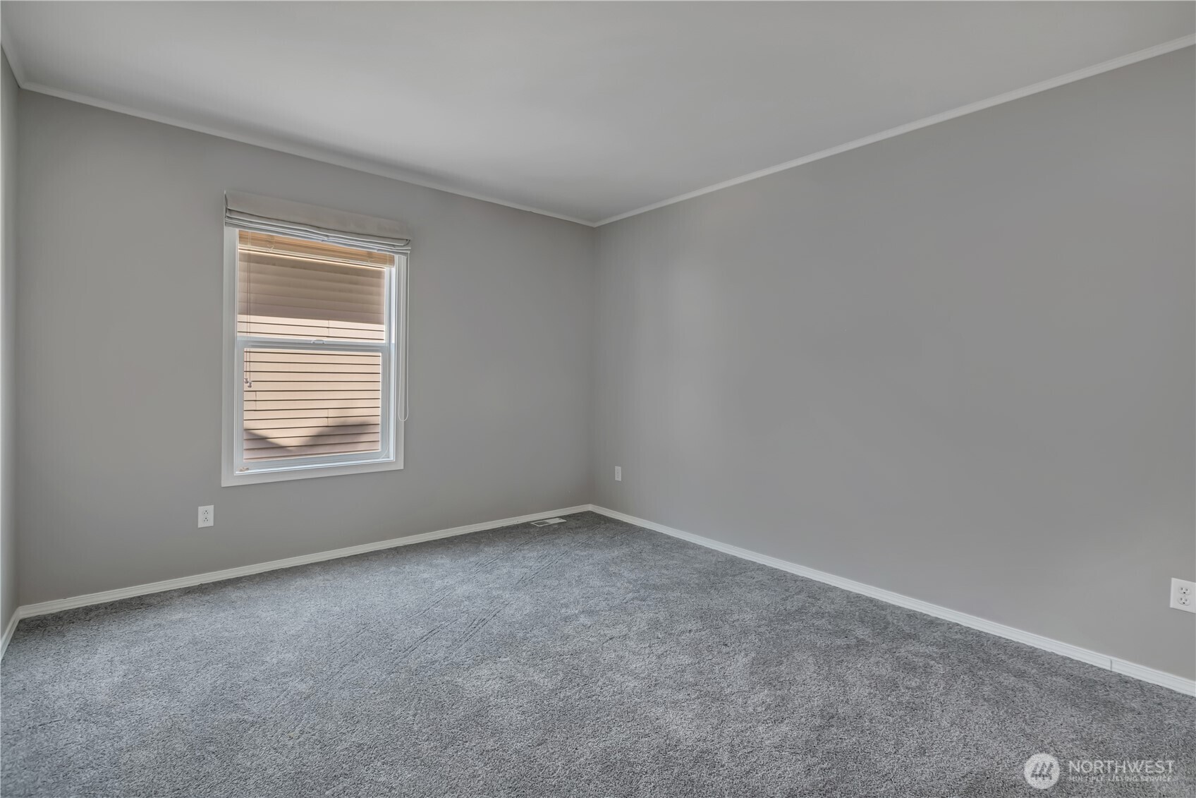 23516 Southeast 243rd Place Maple Valley, WA 98038 - Photo 24 of 31 a view of an empty room with a window