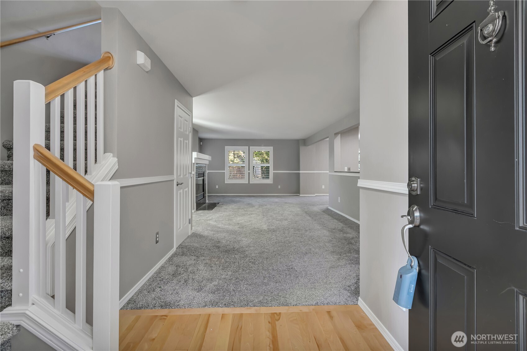 23516 Southeast 243rd Place Maple Valley, WA 98038 - Photo 3 of 33 a view of empty room with front door