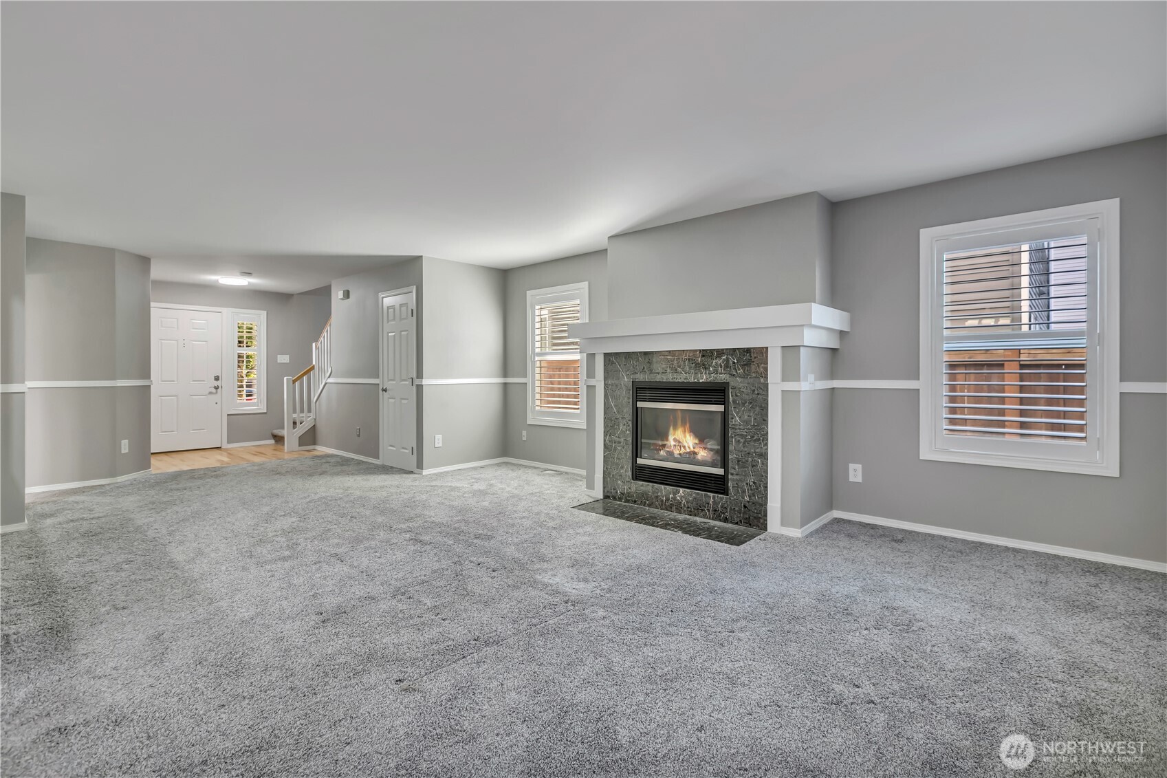 23516 Southeast 243rd Place Maple Valley, WA 98038 - Photo 6 of 33 a view of empty room with a fireplace
