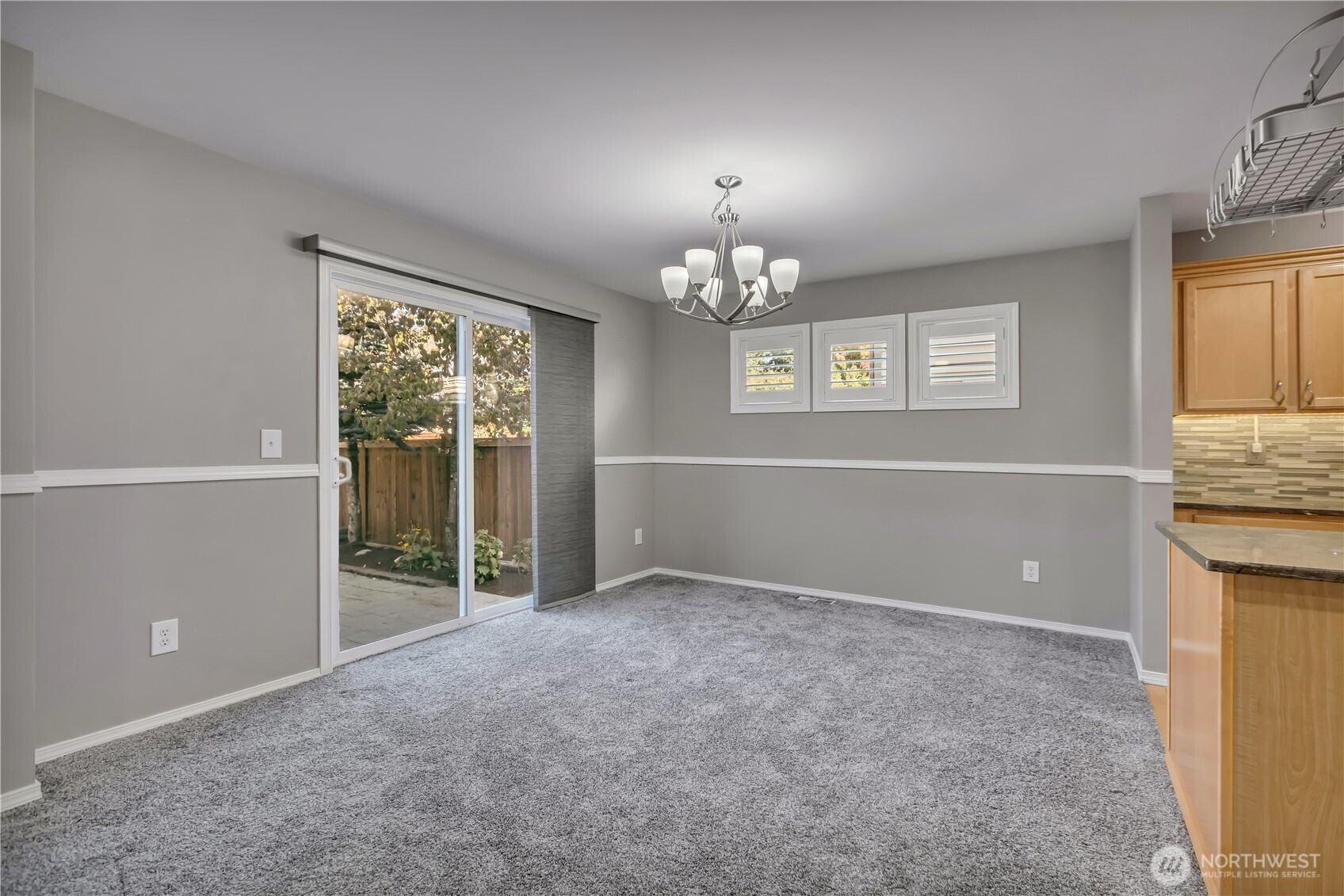 23516 Southeast 243rd Place Maple Valley, WA 98038 - Photo 9 of 33 wooden floor in an empty room with a window