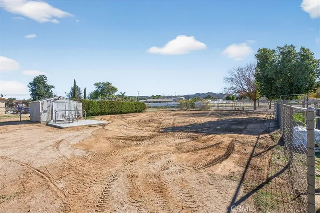 a view of swimming pool with outdoor seating