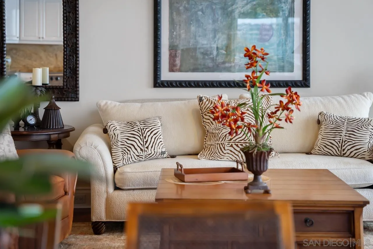 1219 Coast Boulevard, Unit 5 La Jolla, CA 92037 - Photo 17 of 31 a living room with furniture and flowers