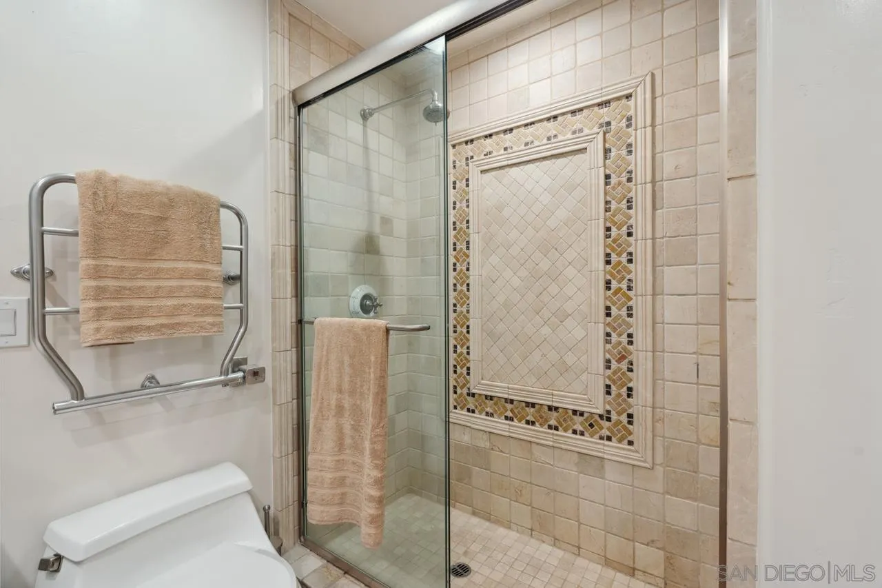 1219 Coast Boulevard, Unit 5 La Jolla, CA 92037 - Photo 25 of 31 a bathroom with a shower