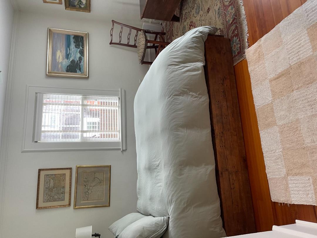 43 Cottage Street Edgartown, MA 02539 - Photo 13 of 24 a bedroom with bed and window