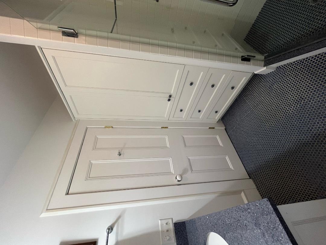 43 Cottage Street Edgartown, MA 02539 - Photo 20 of 24 a view of a closet area fire place