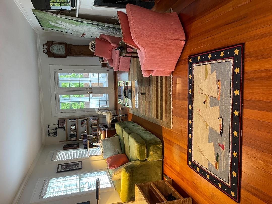 43 Cottage Street Edgartown, MA 02539 - Photo 8 of 24 a room with furniture and wooden floor