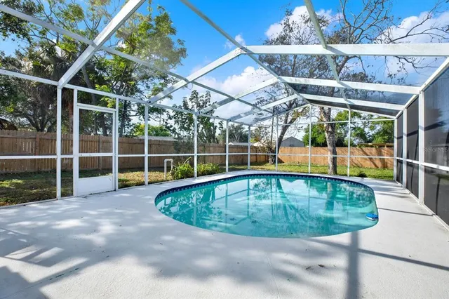 a view of outdoor space with swimming pool