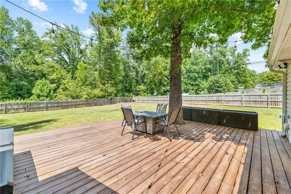 a view of a yard with an outdoor space