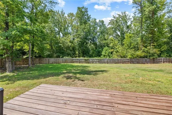 a view of backyard with green space