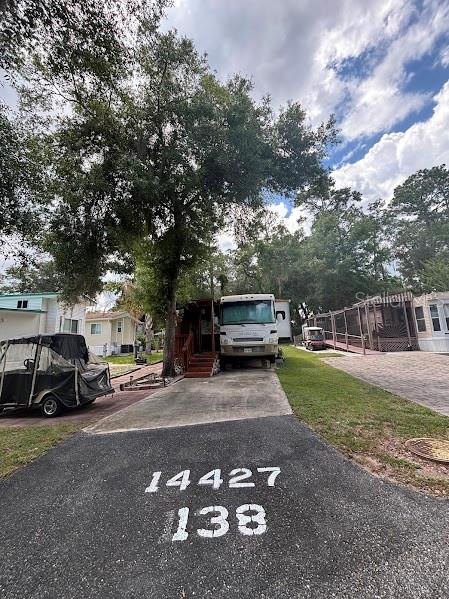 14427 Northeast 252nd Ct Road, Unit 138 Fort McCoy, FL 32134 - Photo 1 of 25