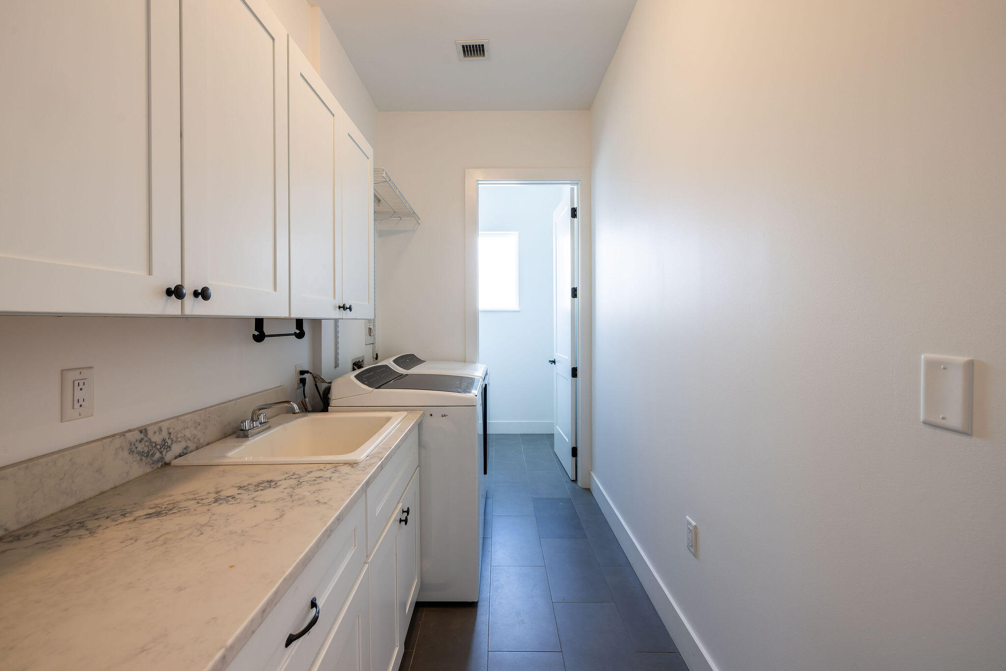 19298 Gulfstream Drive Jupiter, FL 33469 - Photo 54 of 73 Laundry Room