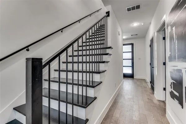 a view of entryway with stairs