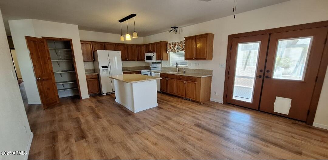 9351 East 28th Street East, Unit 212 Yuma, AZ 85365 - Photo 16 of 54 a view of kitchen with refrigerator stove microwave and cabinets