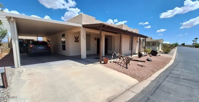a front view of a house with patio