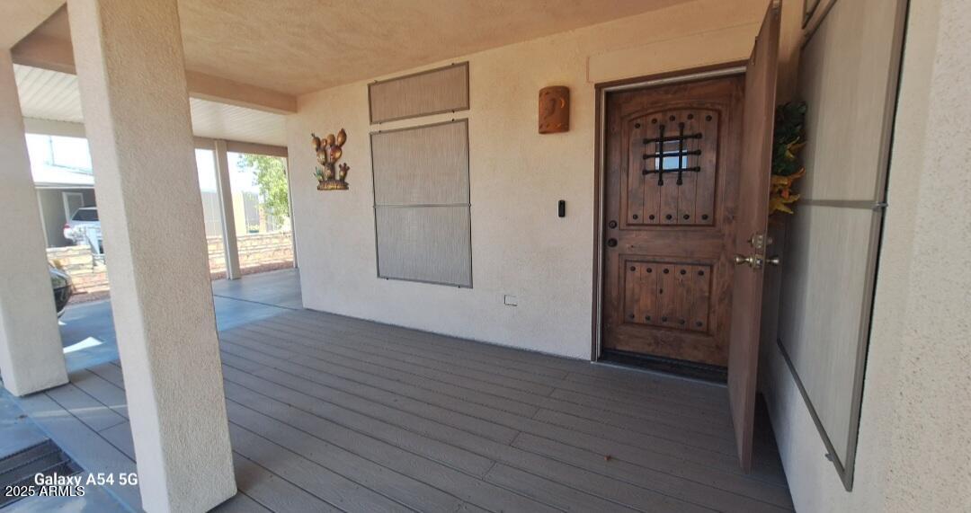 9351 East 28th Street East, Unit 212 Yuma, AZ 85365 - Photo 6 of 54 a view of entryway with wooden floor