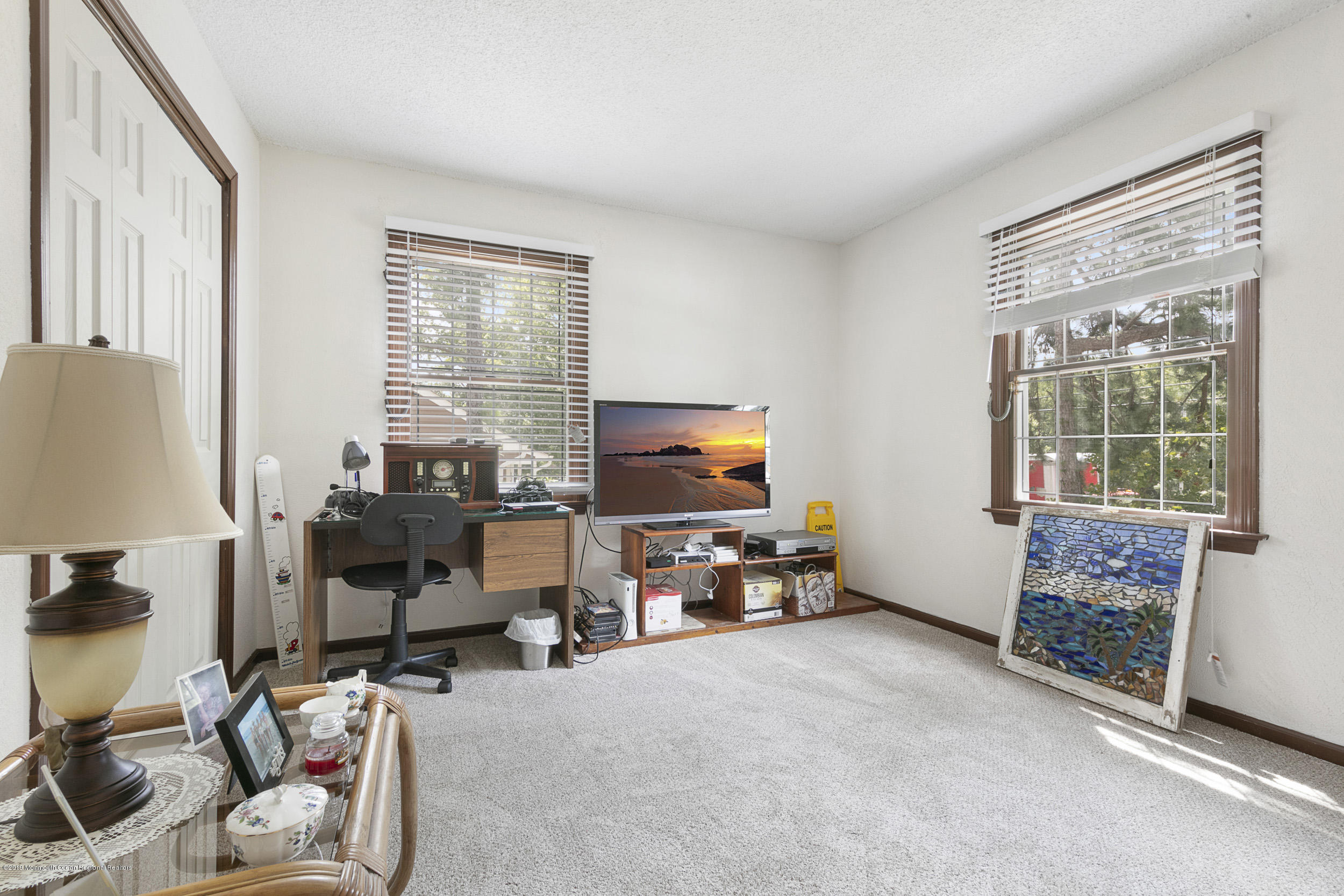292 Compass Road Manahawkin, NJ 08050 - Photo 42 of 56 a view of a livingroom with workspace and a window