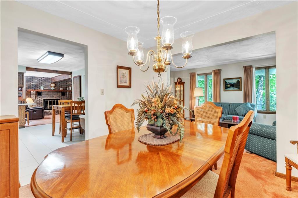 454 Cherokee Drive Butler, PA 16001 - Photo 16 of 29 a dining room with furniture a livingroom and chandelier