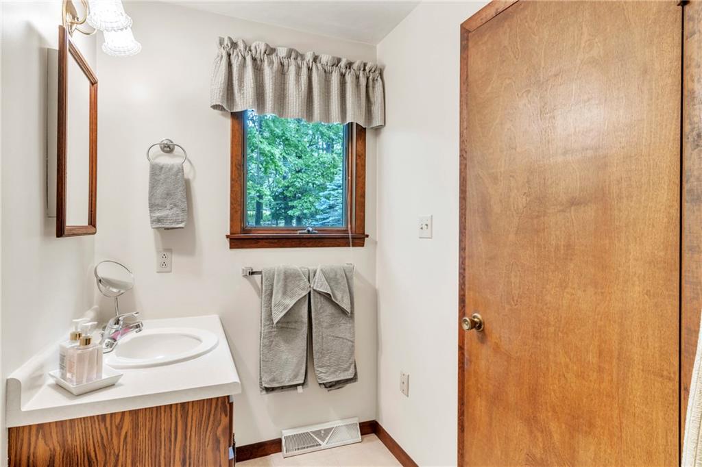454 Cherokee Drive Butler, PA 16001 - Photo 20 of 29 a bathroom with a sink toilet and shower