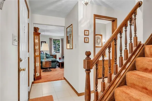 a view of an entryway with staircase