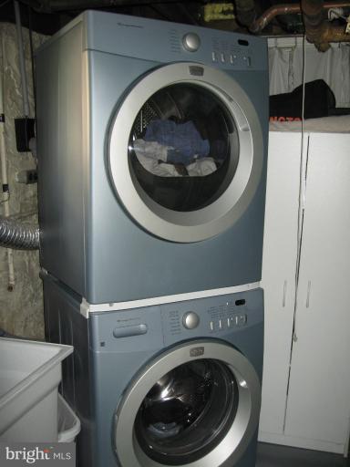 2447 Pickwick Road Baltimore, MD 21207 - Photo 17 of 28 a utility room with dryer and washer
