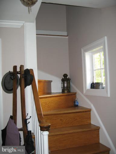 2447 Pickwick Road Baltimore, MD 21207 - Photo 4 of 28 a view of towel hanging in closet