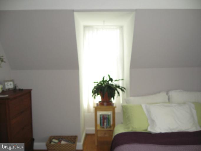 2447 Pickwick Road Baltimore, MD 21207 - Photo 5 of 28 a living room with furniture and a potted plant