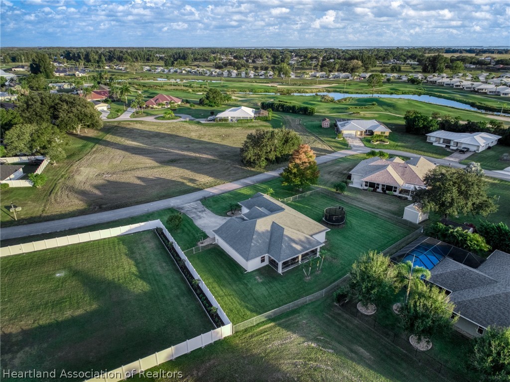 808 Spring Lake Boulevard Sebring, FL 33876 - Photo 33 of 38 a view of a city with a garden