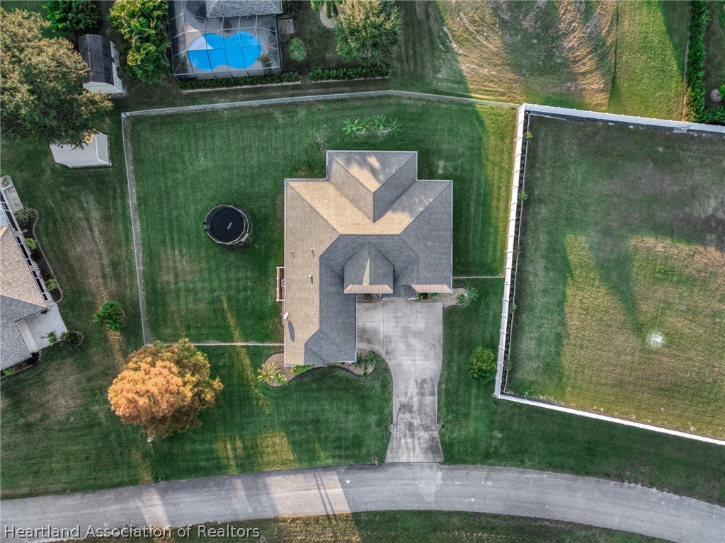 808 Spring Lake Boulevard Sebring, FL 33876 - Photo 38 of 38 an aerial view of a house