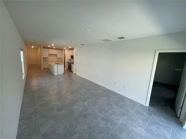 a view of a livingroom with a furniture