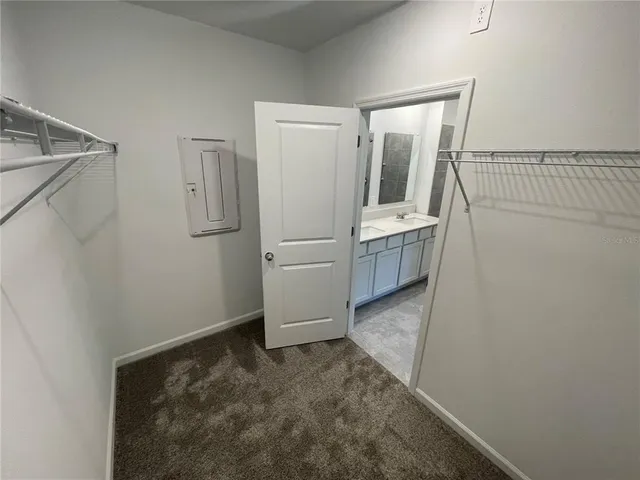 a view of walk in closet with window