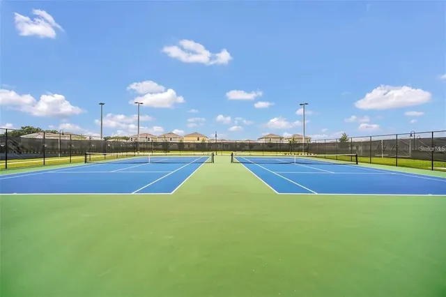 a view of a golf course with a lake