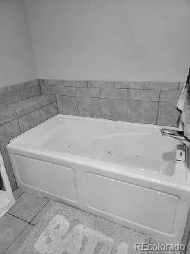a bathroom with a bathtub
