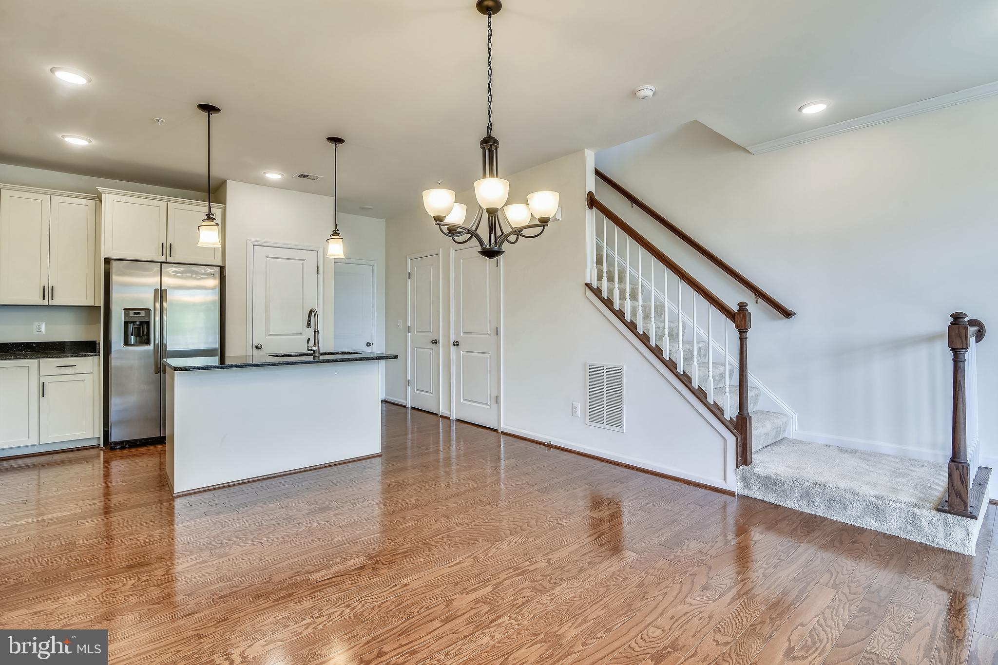 1508 Ribbon Limestone Terrace Southeast Leesburg, VA 20175 - Photo 22 of 79 a view of a kitchen with cabinets and stainless steel appliances