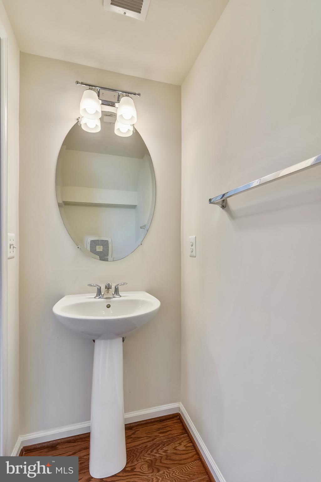 1508 Ribbon Limestone Terrace Southeast Leesburg, VA 20175 - Photo 28 of 79 a bathroom with a sink