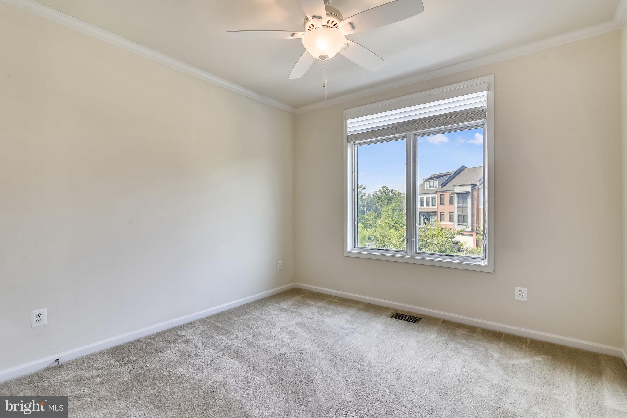 1508 Ribbon Limestone Terrace Southeast Leesburg, VA 20175 - Photo 30 of 79 an empty room with a window and a fan