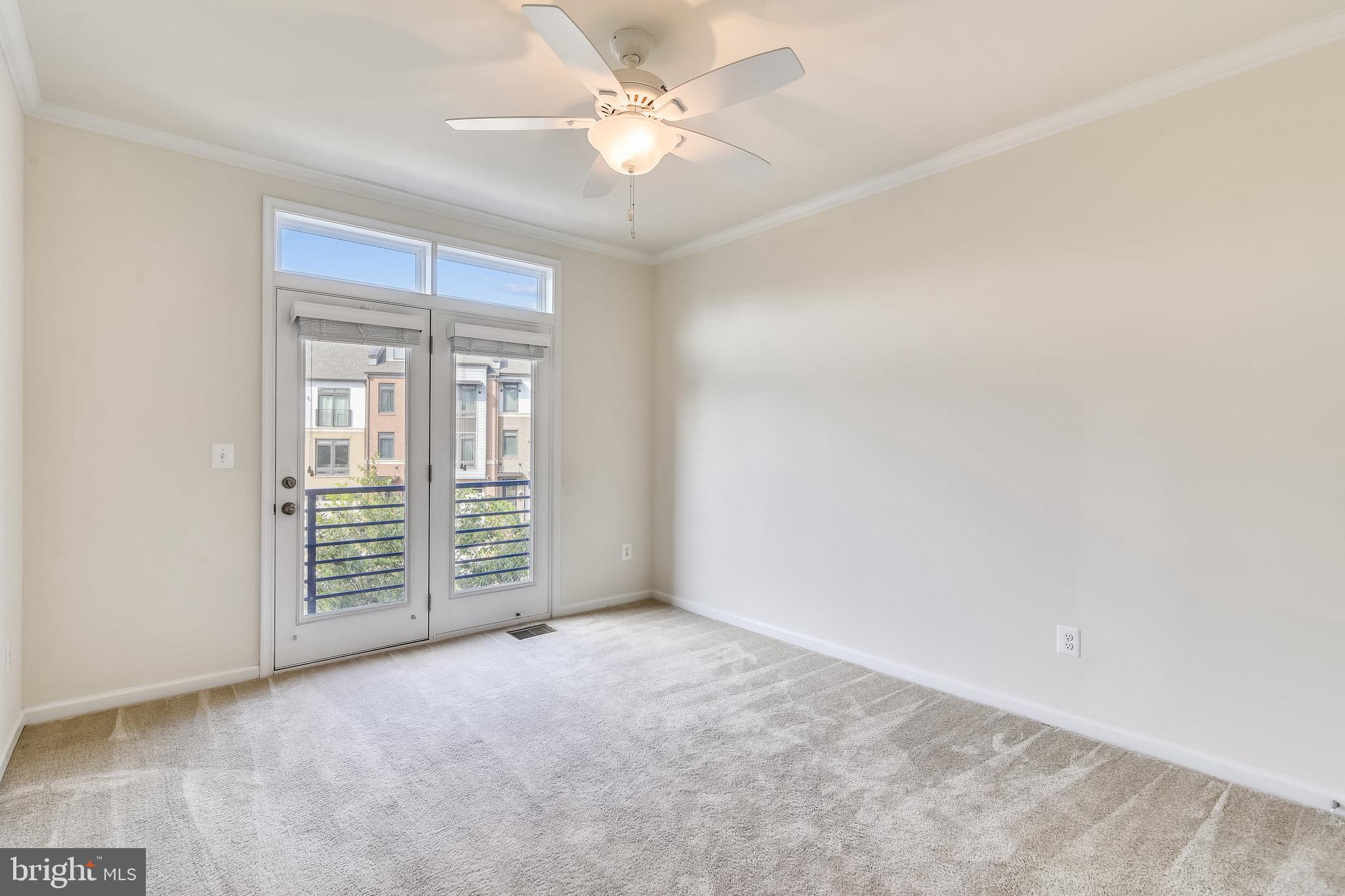 1508 Ribbon Limestone Terrace Southeast Leesburg, VA 20175 - Photo 34 of 79 an empty room with windows and fan