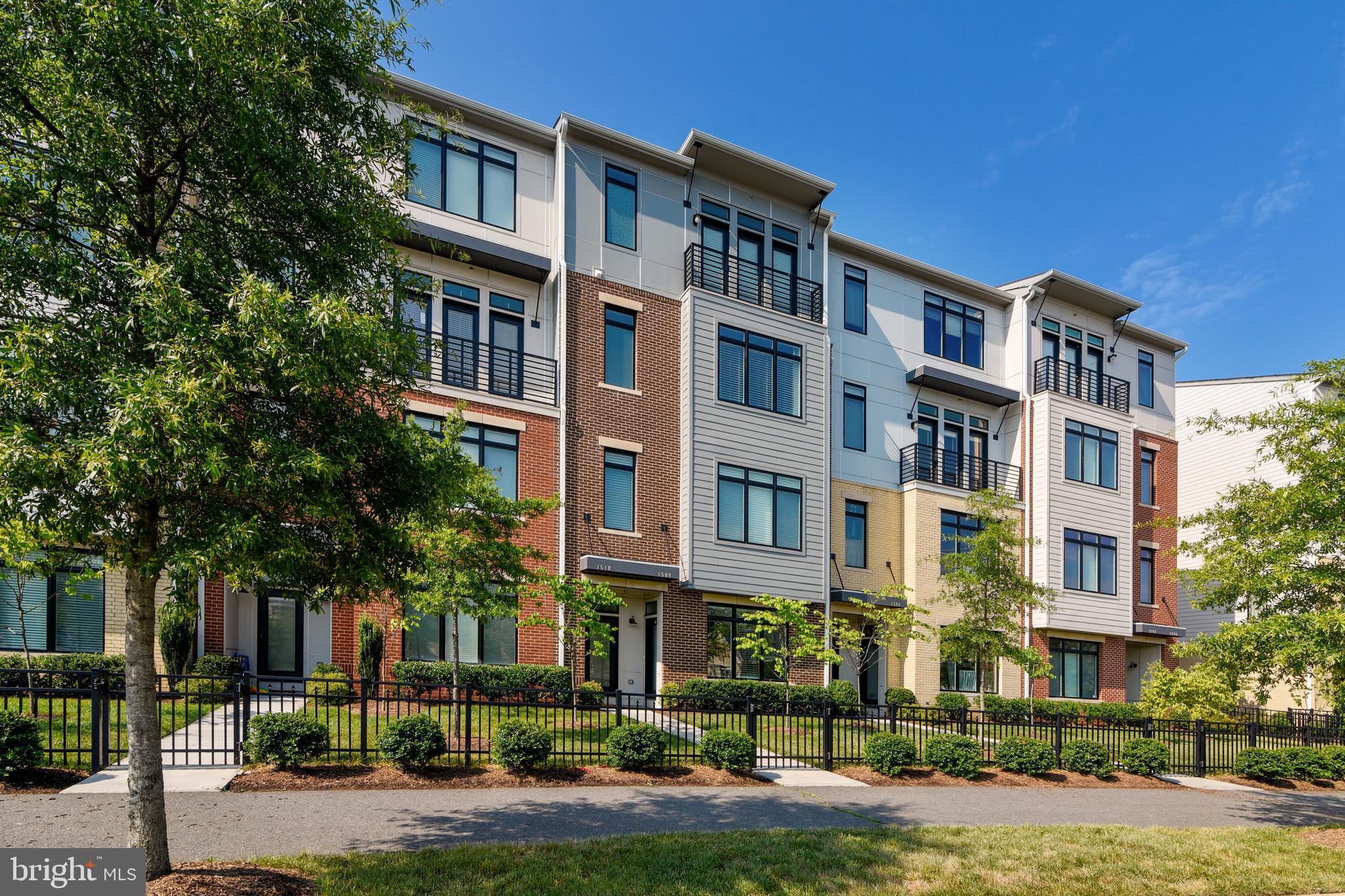 1508 Ribbon Limestone Terrace Southeast Leesburg, VA 20175 - Photo 5 of 79 a front view of a multi story building