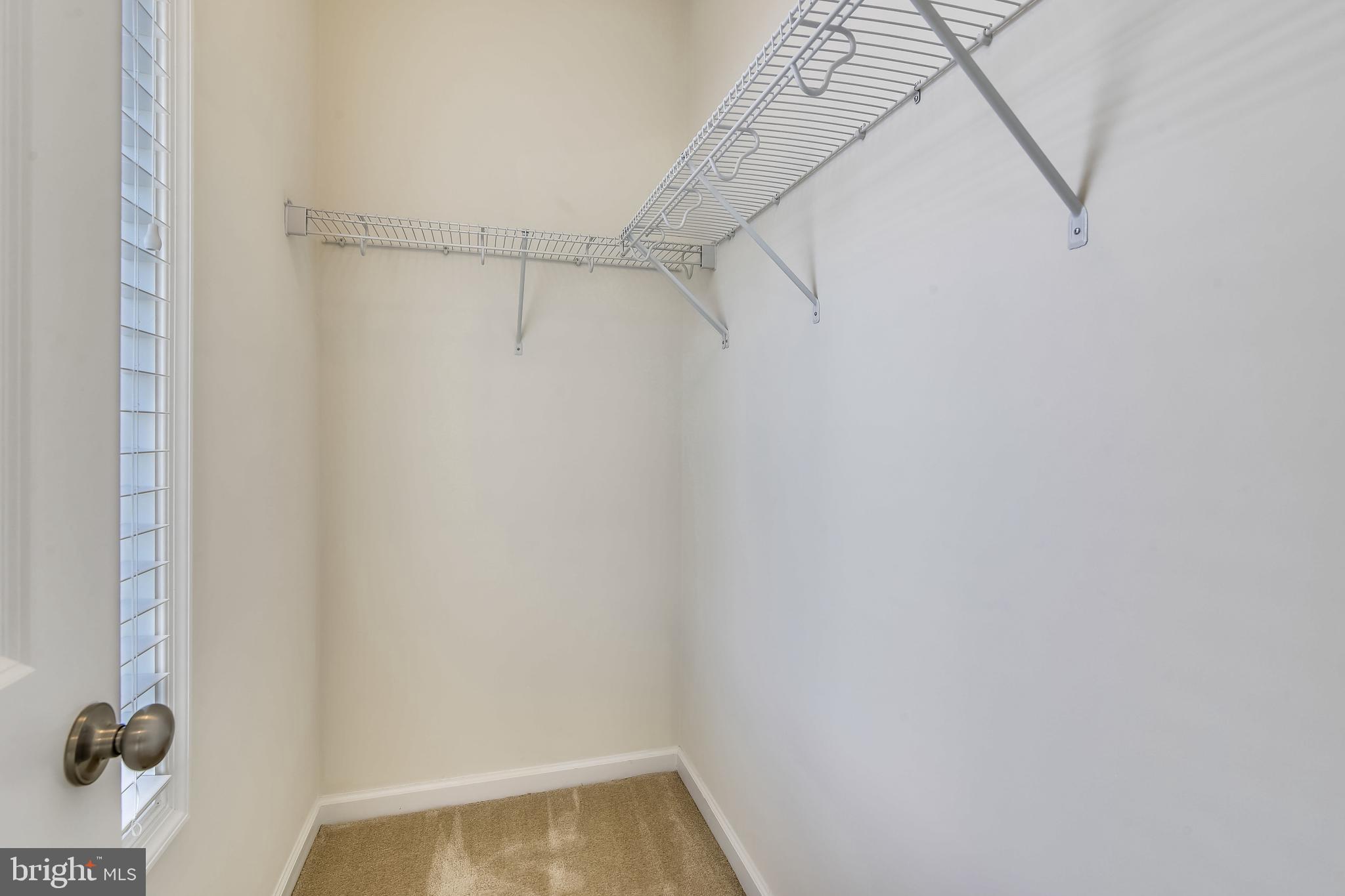 1508 Ribbon Limestone Terrace Southeast Leesburg, VA 20175 - Photo 46 of 79 a view of small space with racks on the wall