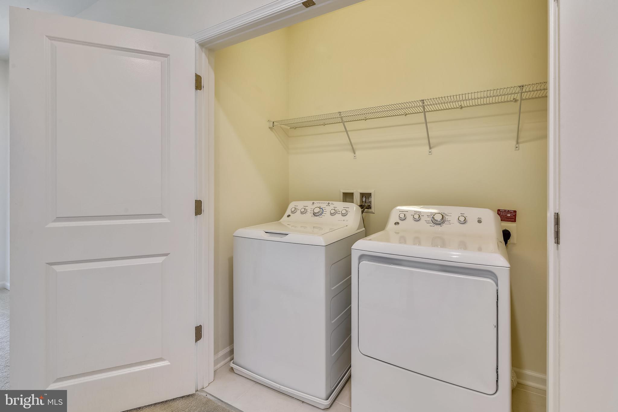 1508 Ribbon Limestone Terrace Southeast Leesburg, VA 20175 - Photo 51 of 79 a utility room with dryer and washer