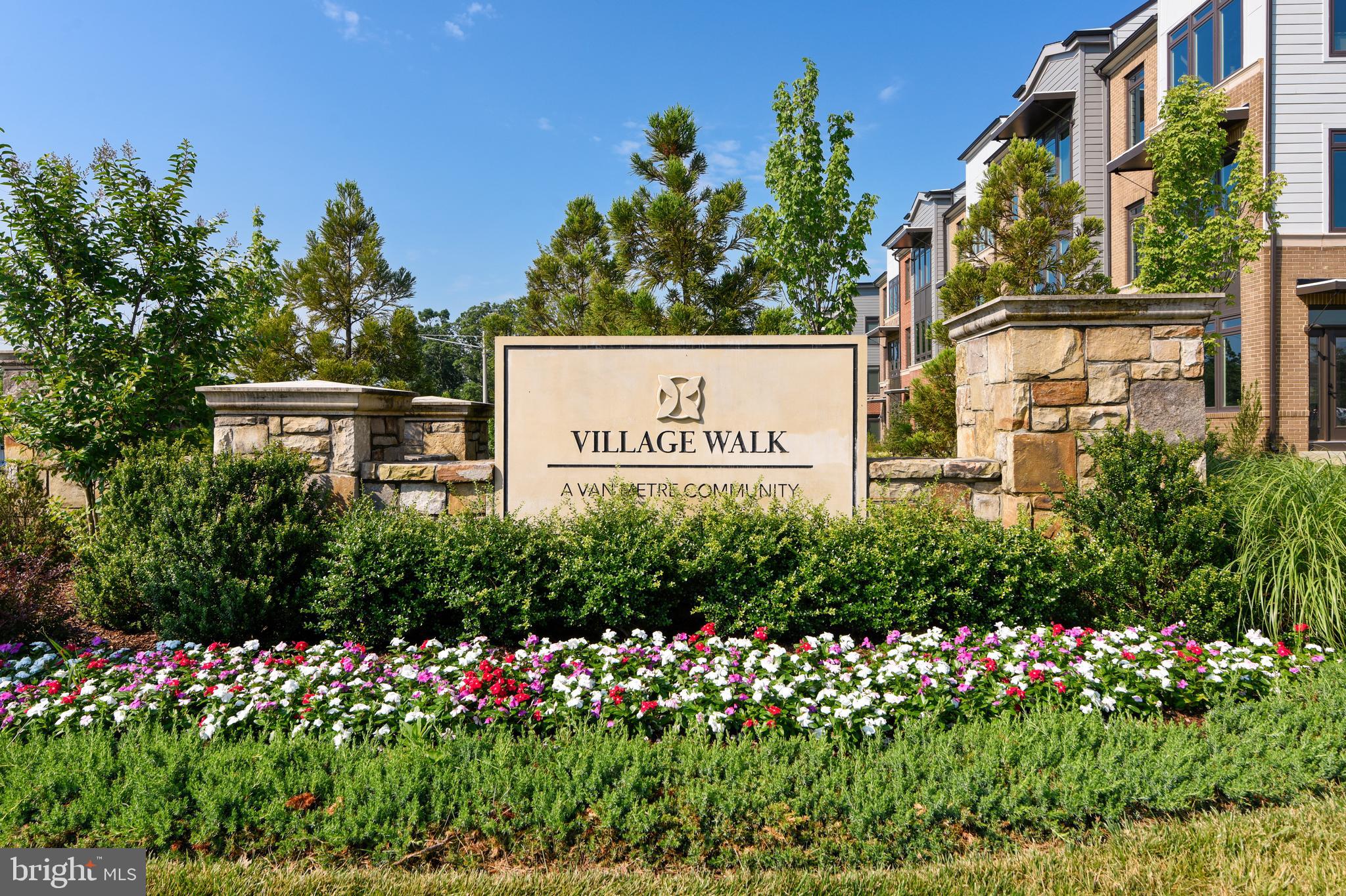 1508 Ribbon Limestone Terrace Southeast Leesburg, VA 20175 - Photo 54 of 79 a sign on the side of a building