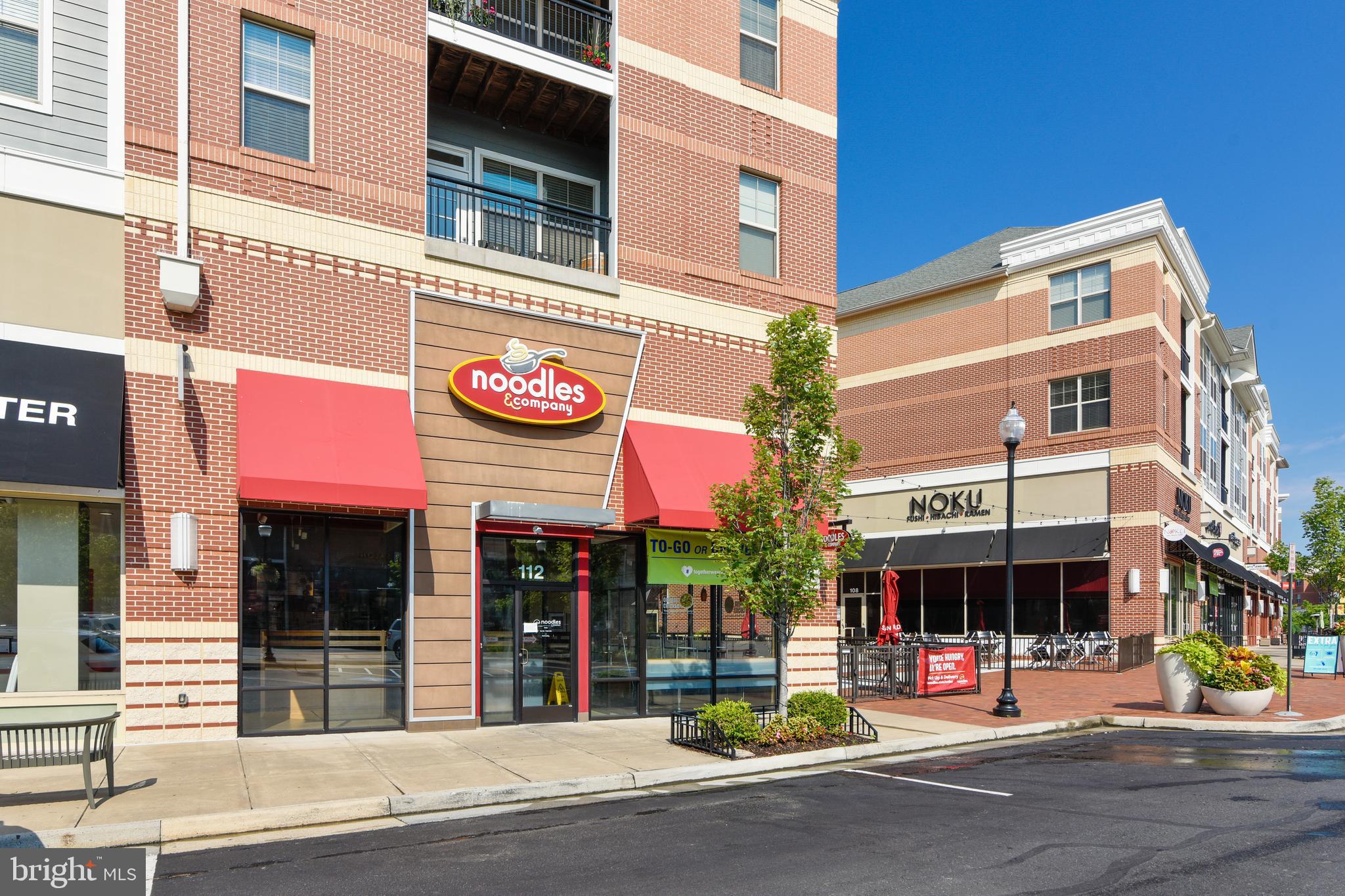 1508 Ribbon Limestone Terrace Southeast Leesburg, VA 20175 - Photo 67 of 79 a view of a food mall next to a building