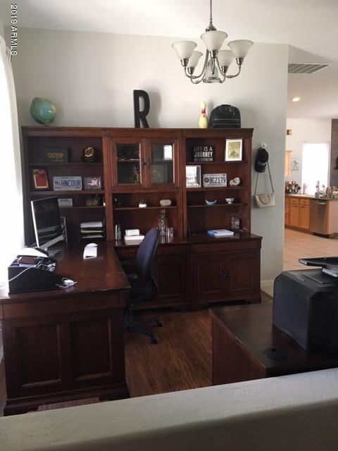 3443 East Rosa Lane Gilbert, AZ 85297 - Photo 16 of 53 a view of a workspace with furniture