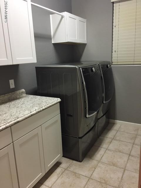 3443 East Rosa Lane Gilbert, AZ 85297 - Photo 35 of 53 a utility room with washer and dryer