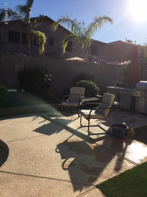 3443 East Rosa Lane Gilbert, AZ 85297 - Photo 39 of 53 a view of a house with a yard