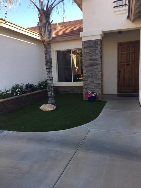 3443 East Rosa Lane Gilbert, AZ 85297 - Photo 9 of 53 a view of a house with a yard
