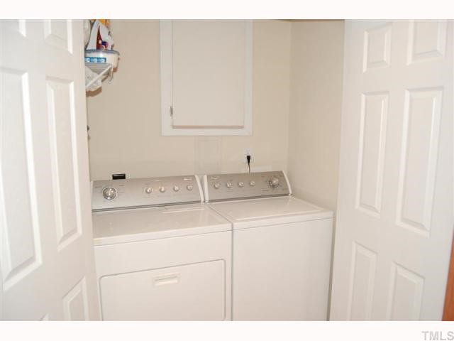 2031 Rivergate Road, Unit 107 Raleigh, NC 27614 - Photo 12 of 12 a utility room with dryer and washer