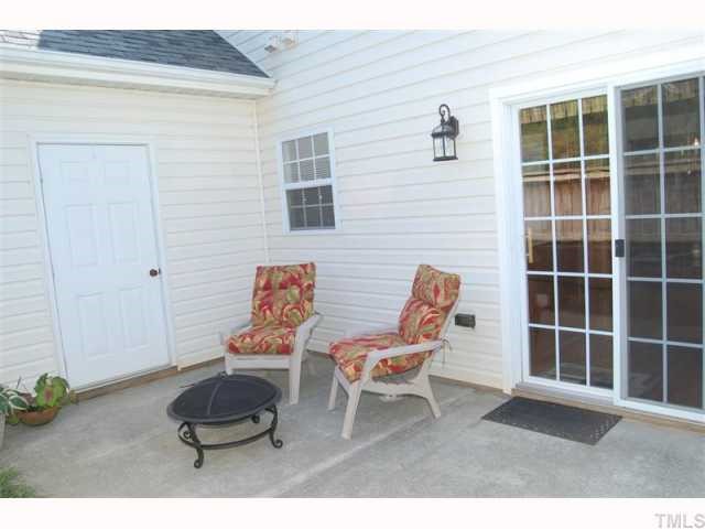 2031 Rivergate Road, Unit 107 Raleigh, NC 27614 - Photo 2 of 12 a living room with furniture and a window